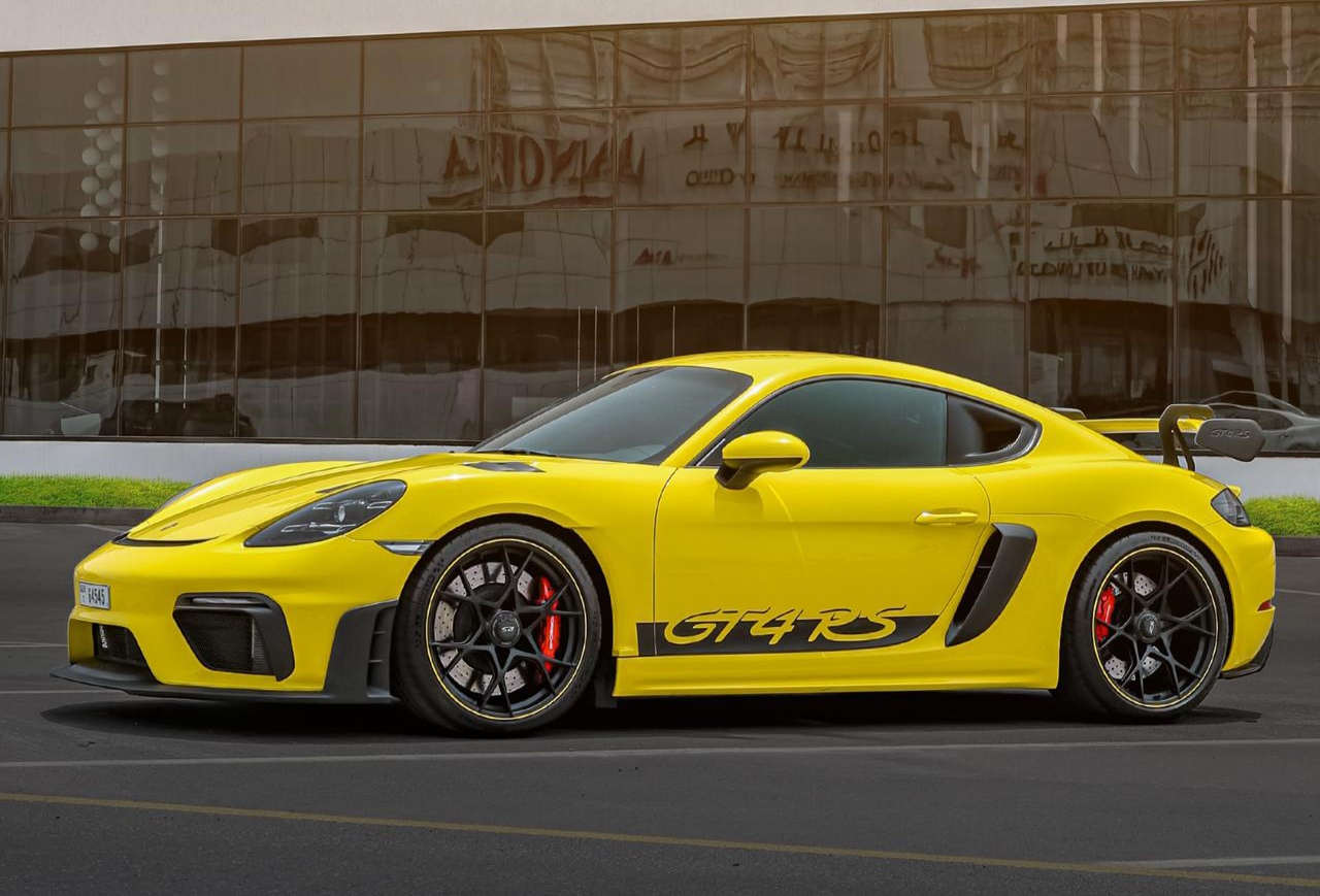 Rent Porsche Cayman YELLOW 2023 in Dubai , UAE 