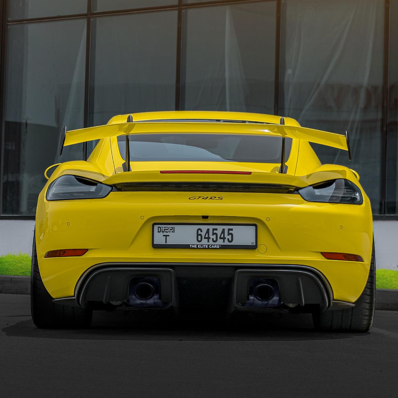 Rent Porsche Cayman YELLOW 2023 in Dubai , UAE 