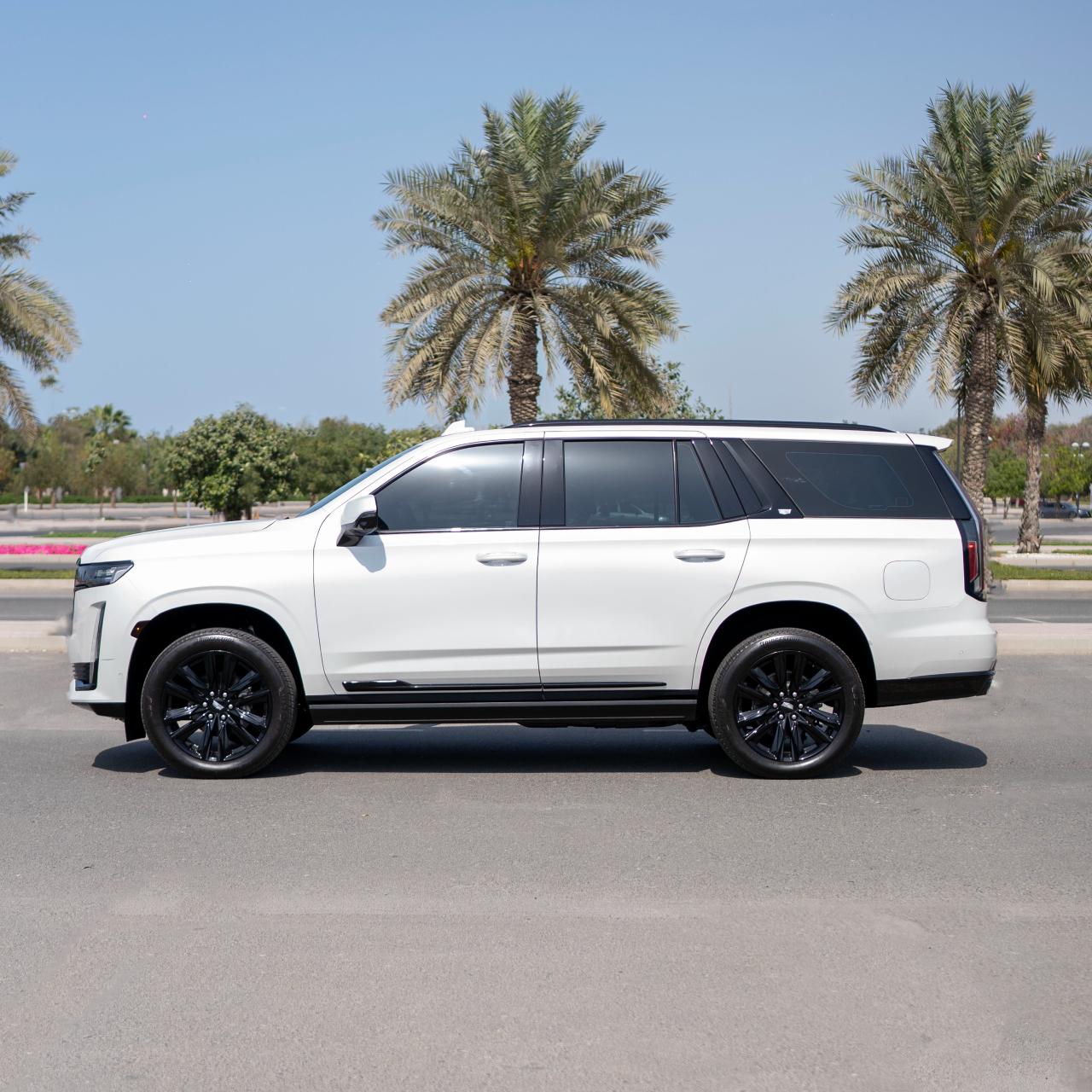 Rent Escalade WHITE 2025 with chauffeur in Dubai , UAE 